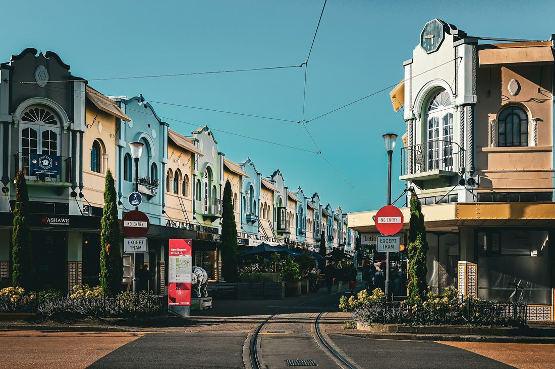 Pastel shopfronts and tram tracks on New Regent Street, Christchurch