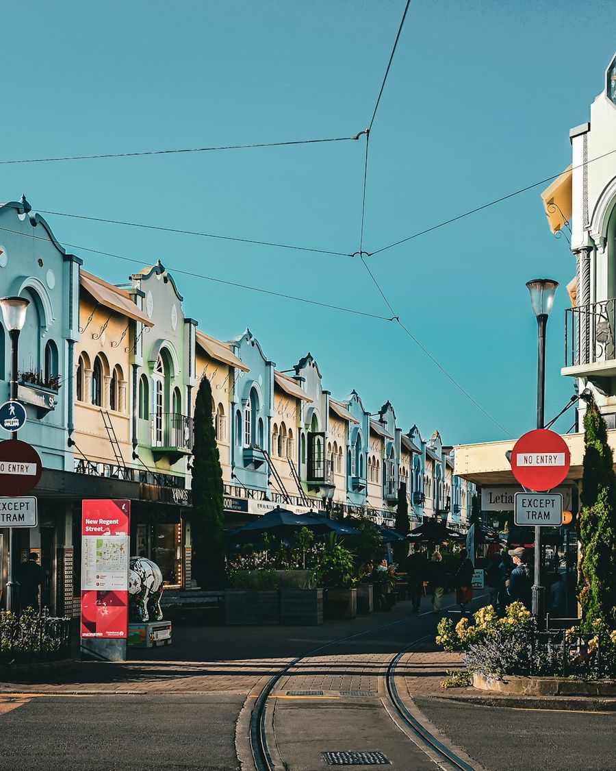 Pastel shopfronts and tram tracks on New Regent Street, Christchurch